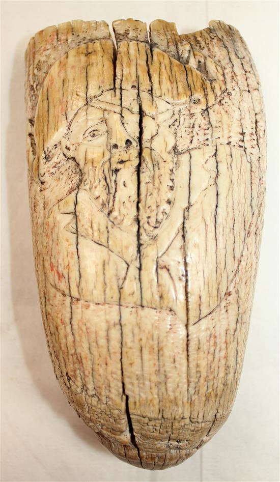 A 17th century carved whales tooth scrimshaw, 5.5in.